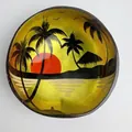 Natural coconut bowl with hand-painted yellow tropical sunset scene and palm tree motifs - Gold Coconut Tree Style