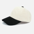 Detailed macro shot of vintage corduroy baseball cap texture in black and white contrast - Black