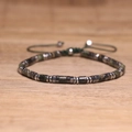 Adjustable woven bracelet with dark green striped stone beads and silver metal accents - No.94 Picasso Cord
