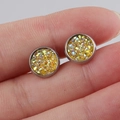 Macro detail of 8mm round stainless steel studs with sparkling yellow glitter inlay - Yellow/Gold Foil (31)