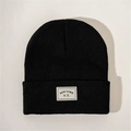 Detail of black knitted beanie with New York embroidered patch and thick ribbed texture - M101 Black With Label