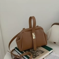 Classic brown leather doctor bag with gold hardware and removable shoulder strap - Brown