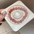 Macro detail of natural pink strawberry quartz beads on a minimalist wooden display tray - 33# Bracelet (6mm/Box)