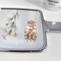 Mini marble acetate hair claw clip with creamy beige and pink tones on mirror surface - Floral Milk Coffee