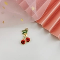Detail of cherry charm with red crystals and green leaves for DIY jewelry making - Full Diamond Style