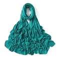 Close-up of dark teal modal jersey scarf fabric with fine overlock stitching edges - Deep Teal (#12)