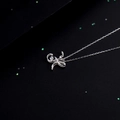 925 silver necklace with dancing zircon stone in H-shaped letter pendant on black background - Style H Alphabet (NS869)
