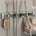 Adhesive wall-mounted storage rack with 4 hooks and rollers in brushed metal finish - Mop Rack with 3 Clips & 4 Hooks / Gunmetal