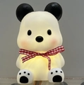 Cute panda shaped bedside night light with red ribbon bow and warm glowing effect - Cool Bear Red Ribbon