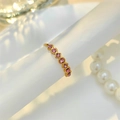 Adjustable gold ring with pink zircons on wave band, elegant jewelry display - Adjustable Open / Gold with Pink Zirconia
