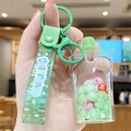 Green bubble tea bear keychain with floating beads and a daydream cartoon strap - Jelly Squeezer - Green