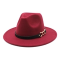 Detail of burgundy wool fedora featuring black leather strap and gold chain buckle detail - Burgundy