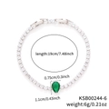 Silver tennis bracelet with square zircons and pear-cut green stone on white background - White Gold Green Zirconia