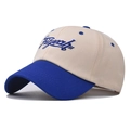 Detail of Flyeah cursive embroidery on beige and royal blue cotton baseball cap - Adjustable / Beige & Blue