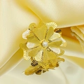 Detailed macro view of layered gold hollow flower petals with a central pearl inlay - Adjustable Open / Multilayer Silk Hollow Pearl Flower Style (KR113264-SP)