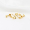 Detailed macro of gold plated screw-back ear clip converters with adjustable u-shape - Type 2 Bullet Head Spiral Converter 18K Gold