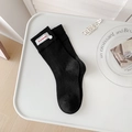 Black ribbed mid-calf cotton socks with white label and button detail in tray - One Size / Black