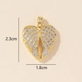 Detailed size view of gold heart pendant with micro-pave zircons, 2.3cm by 1.8cm - 0228-19/Gold Pave Leaf Heart