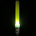Detail of green LED glow stick with white handle and on/off power switch button - Show Round Wand Yellow