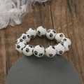 Handmade wooden bead bracelet featuring black paw prints for Halloween accessory - White Black Paw Print