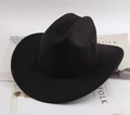 Classic black wool felt fedora hat with wide wavy brim on a minimalist white background - One Groove With Rope / Black