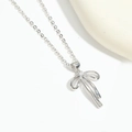 Collier nœud argenté avec pendentif en zircon sur chaîne fine au style minimaliste - Nœud Argenté / Argenté