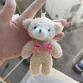 Beige plush teddy bear keychain featuring a pink polka dot bow and silver ball chain - Polka Dot Pink Bowtie Bear