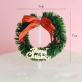 Green Christmas wreath cake topper with red bow and gold Merry Christmas sign, 7x7cm - Red Bow Wreath