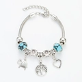 Dettaglio del bracciale albero della vita argento con perle blu e ciondoli elefante cuore - Stile Perline Di Vetro Macchiato Blu (D122)