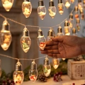LED Christmas wish bottle string light featuring a mini Santa Claus and artificial snow - Mixed Christmas Figures / 1.5M 10LEDs-2 Batteries Steady On