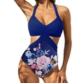 Detail of cut-out waist design and floral print on a navy blue one-piece swimsuit - S / Blue Floral
