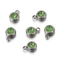Green crystal charm pendant with faceted cut in silver stainless steel setting - Steel Base Green
