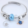 Celestial beaded stainless steel bracelet with star, moon and Saturn planet charms - Blue