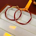 French style red enamel hoop earrings with gold trim on white velvet jewelry box - Burgundy