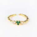 Macro view of adjustable gold ring featuring three green heart-shaped zircons and textured band - Three-Stone Green Zircon Heart Gold Style (Style 21 Gold)