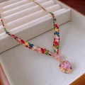 Macro detail of vintage gold necklace featuring vibrant colorful gemstones in a jewelry box - 6# Necklace-Gold Multicolor Heart Style