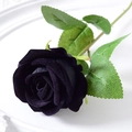 Single black velvet artificial rose with green leaves on white textured background - 7cm / Black (Velvet)