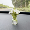 Car dashboard vase ornament with white artificial flowers in a clear glass bottle - White Jasmine