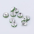 Silver spacer beads with green rhinestones for DIY jewelry making and bracelet design - 6mm / Silver + Green Rhinestone