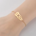 Pulsera de acero inoxidable dorado con colgante de diente molar de diseño minimalista - Dorado