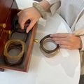Amber marble resin bangles with irregular vintage patterns in a wooden jewelry box - Inner Diameter 66mm / Dark Coffee
