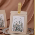 Off-white floral wedding favor box with gold leather handle and vintage botanical prints - Leather Handle Style / Champagne Beige