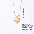 Gold heart necklace with diamond T initial on a 50cm snake chain, weight 7.3g - Letter T