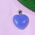 Purple crystal heart pendant with silver bail shown on a soft pink background - 61-Glass Blue