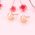 Elegante Goldohrringe mit runden rosa Naturperlen und Akzenten aus weißem Zirkon - 925er Silber / Rosa Perle (Vergoldet)
