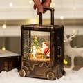 Vintage bronze suitcase Christmas lantern with Santa scene and swirling glitter lights - Santa With Child