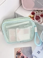 Detalle del neceser de malla verde menta con asa de algodón blanco y cremallera - Con clip de pez / Verde