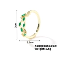 Golden leaf-shaped open ring with green marquise stones and small clear gems - Gold with Green Stone