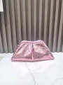 Detail shot of pink snake texture cloud clutch with metallic buckle on marble surface - Pink Mesh Snake