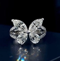Elegant butterfly ring with marquise cut cubic zirconia on a pavé diamond band - Ur0695